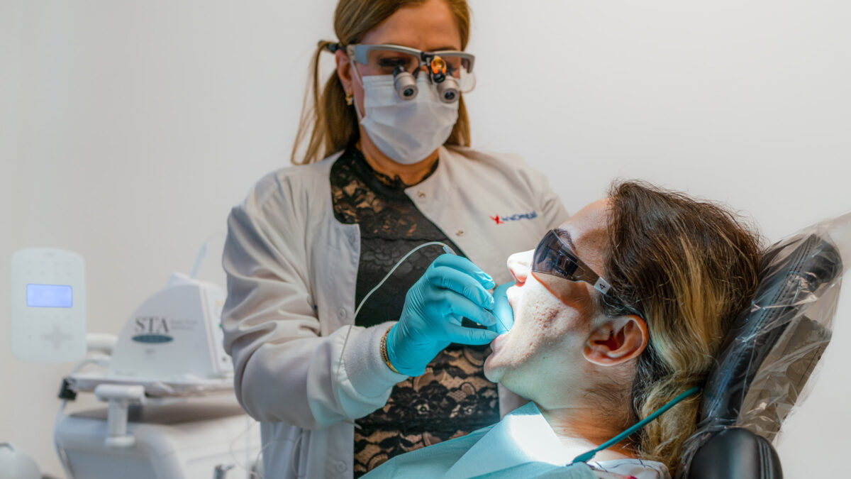 Dr. Maryam Horiyat performing a dental procedure on her patient