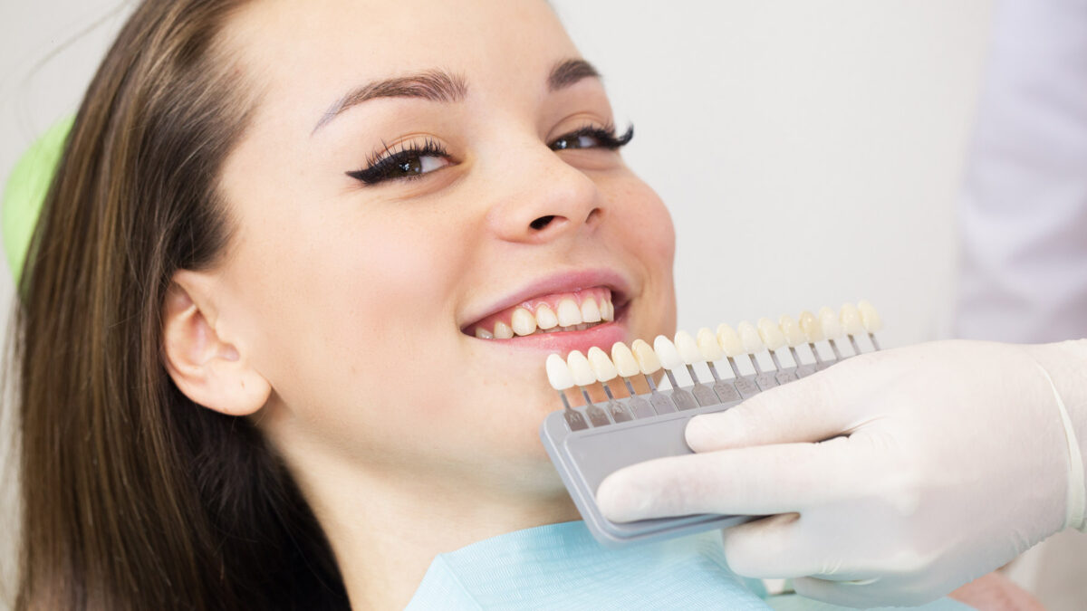 young teenage female patient of Aria Dental choosing Ceramic Crown