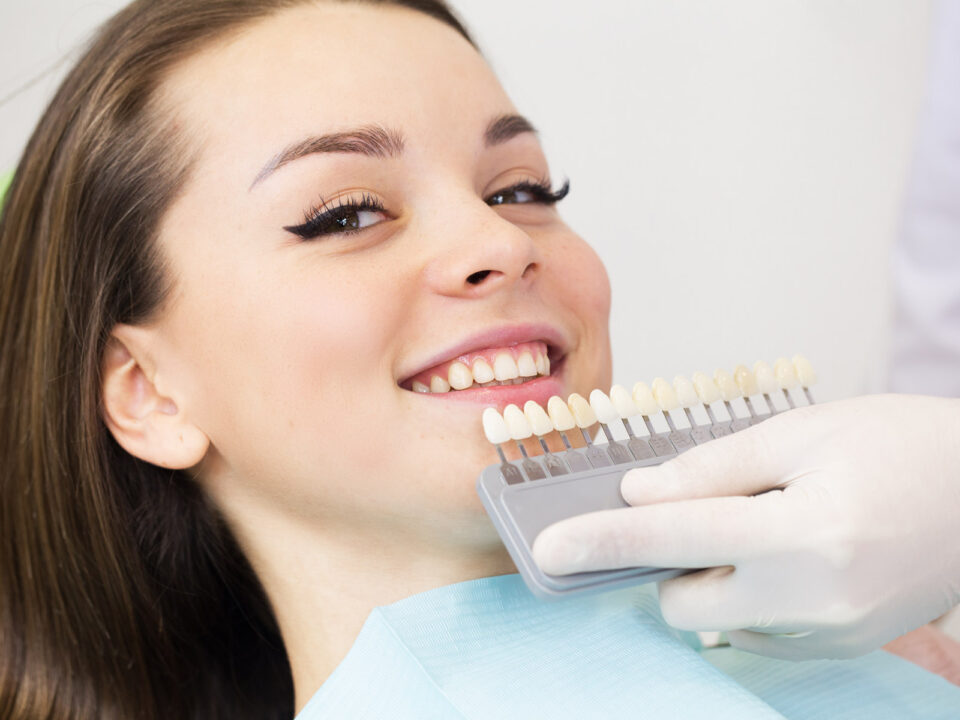 young teenage female patient of Aria Dental choosing Ceramic Crown