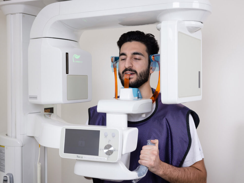 an Aria Dental male patient getting X-Ray at Aria Dental Care office
