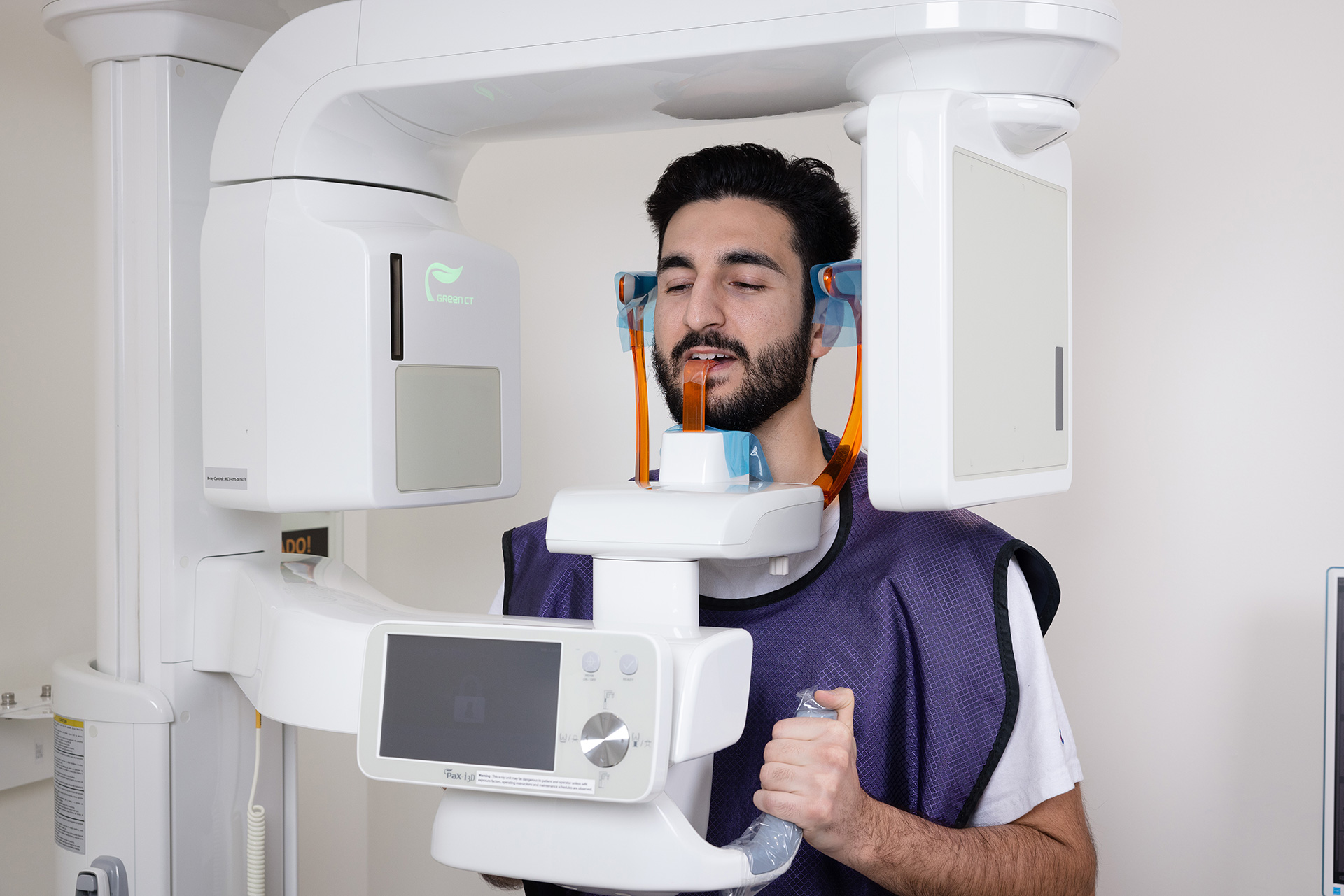 Aria Dental patient in Cone Beam CT scan device
